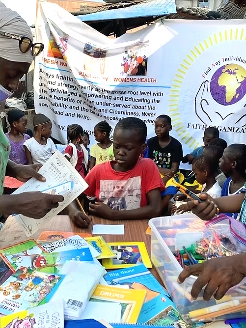 Children and learning materials during a F.A.I.T.H. education activity