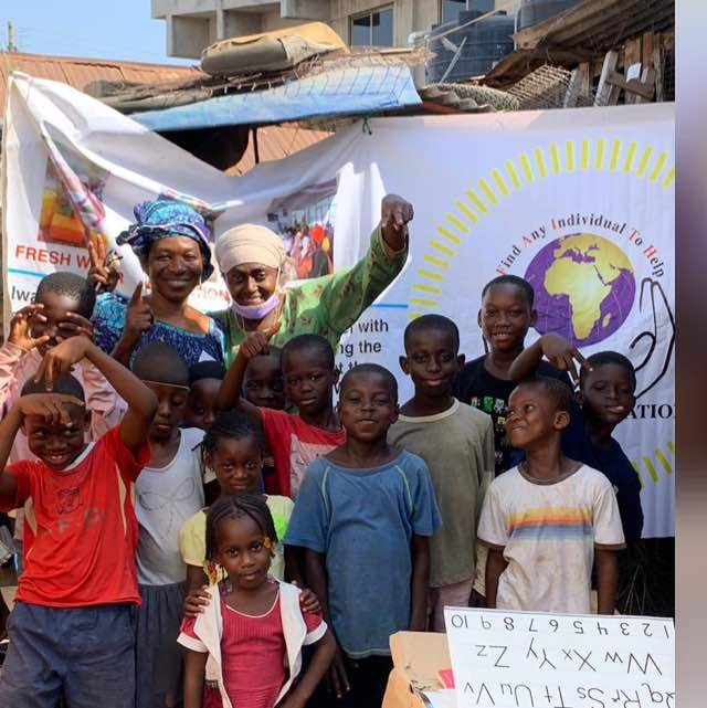 Children gathered during a F.A.I.T.H. community education activity