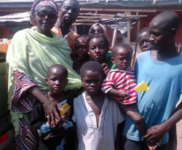 Family members gathered in their community